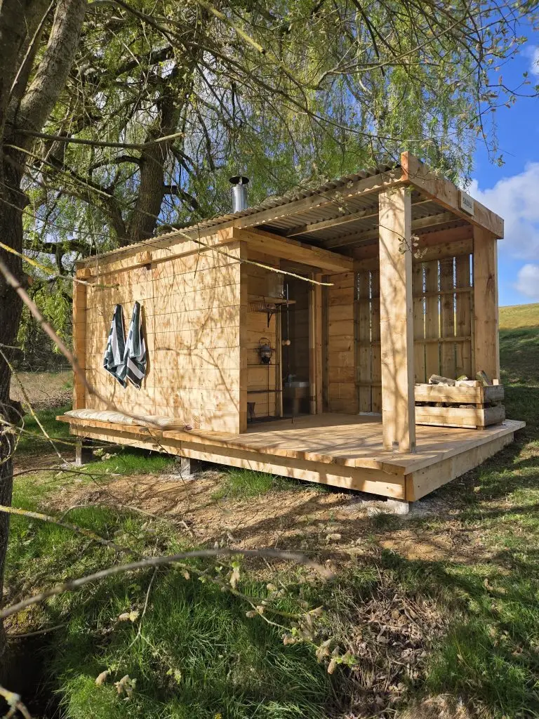 Wood-fired sauna at Leys Farm beside the woodland lake