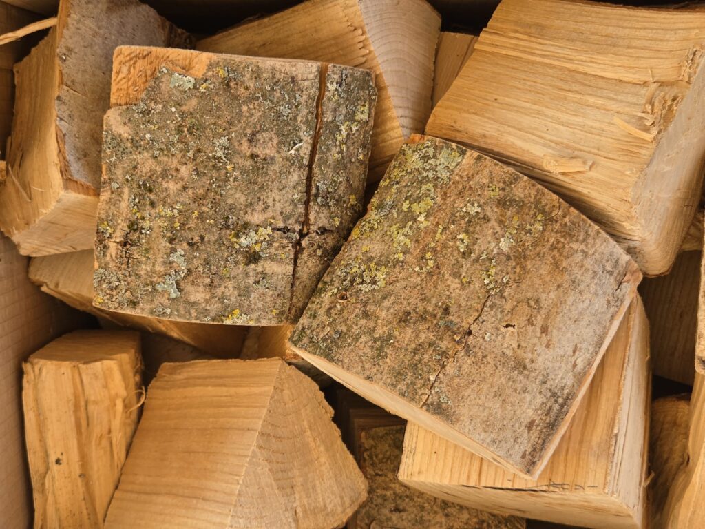 Close-up of split ash logs from Leys Farm