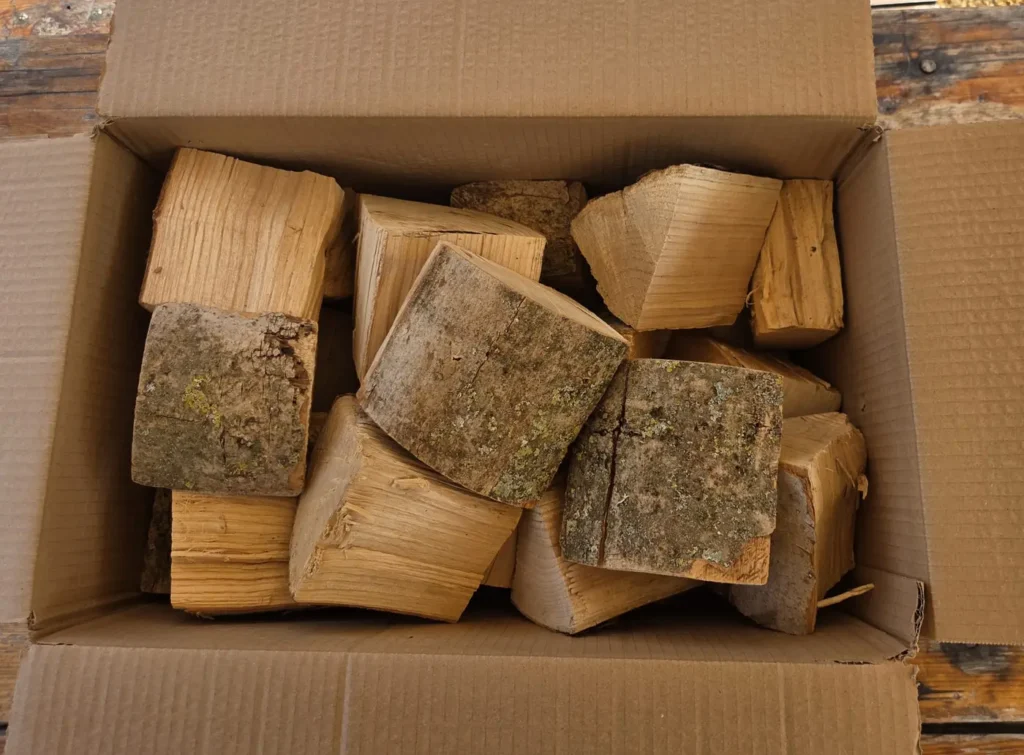 Box of air-dried English ash logs from Leys Farm
